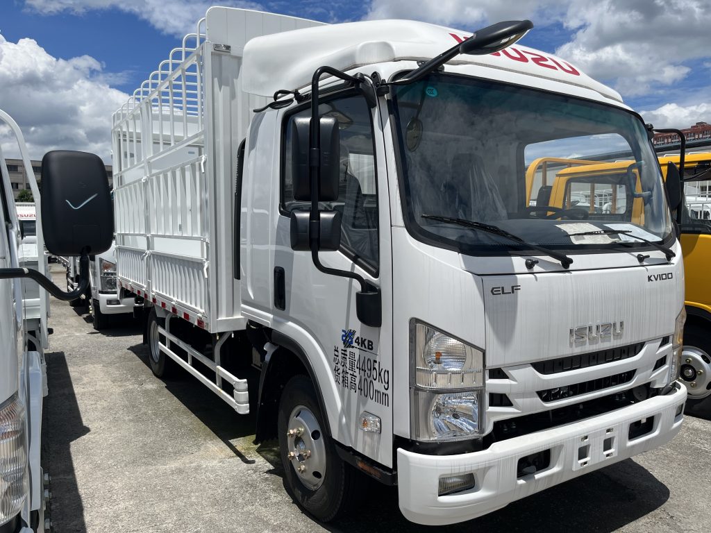 ISUZU KV100 single cab stake truck, white fence cargo body vehicle, light duty commercial transport truck